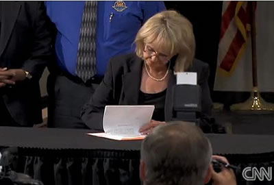 Governor Jan Brewer signs Arizona state law SB 1070