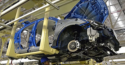 Mexican auto worker at Mazda auto assembly plant in Mexico