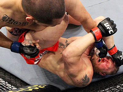 UFC 121 Cain Velasquez beats Brock Lesnar to become MMA World Heaveyweight Champion