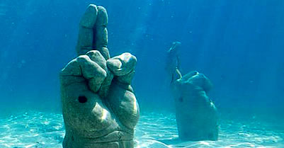 Unity Hand Sign Sculptures at Cancun Underwater Museum